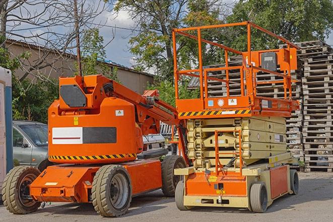 forklift moving heavy loads in busy warehouse setting in Aventura, FL